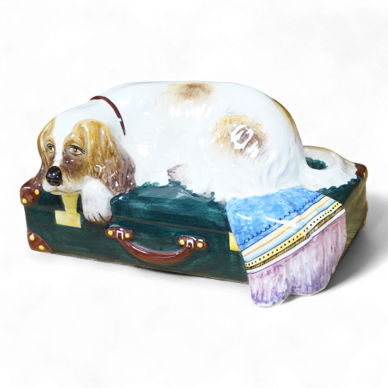 A Nove Italia ceramic sleeping dog, ‘exclusive for Tiffany & Co’ 19cm wide